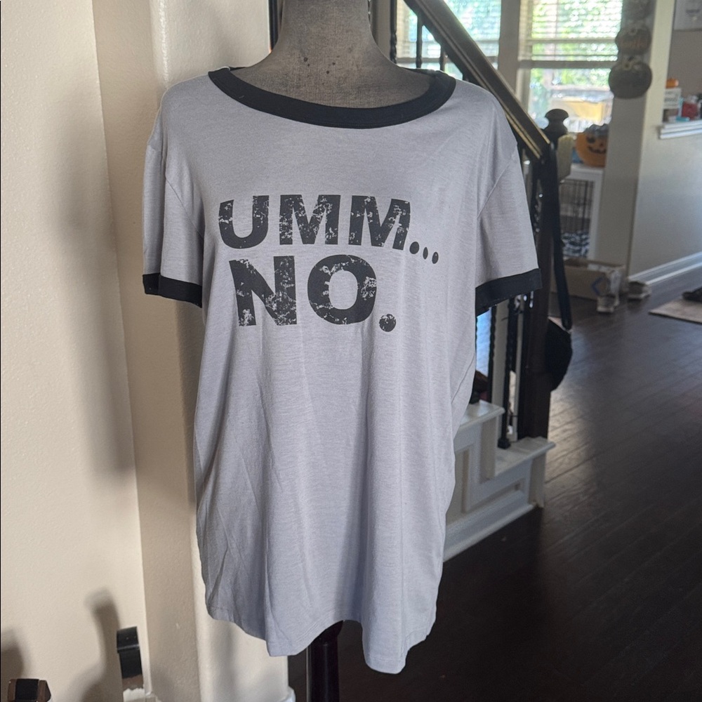 Lularoe Liv Tee size L

95% Polyester 
5% spandex